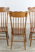 Load image into Gallery viewer, Set of Four Vintage Carved Oak Pressed Back Spindle Dining Chairs

