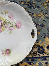 Load image into Gallery viewer, Antique Handled Porcelain Cake Plate – Pink Rose Floral Design with Embossed Scroll Edge, Early 1900s
