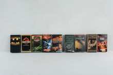 Load image into Gallery viewer, Vintage VHS Movie Lot 9 Batman Jurassic Park TMNT Twister Pearl Harbor Titan AE
