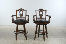 Load image into Gallery viewer, Ashley North Shore D553 130 Swivel Bar Stools Set of 2 Carved Wood 30 Inch
