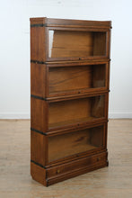 Load image into Gallery viewer, Antique 4-Stack Tiger Oak Barrister Bookcase with Lower Drawer (c. 1890–1910)
