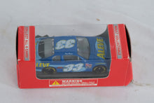Load image into Gallery viewer, 2002 Team Caliber #33 Aleve Monte Carlo Die-Cast Car – Bayer Racing 10th Anniversary Edition (New in Box)
