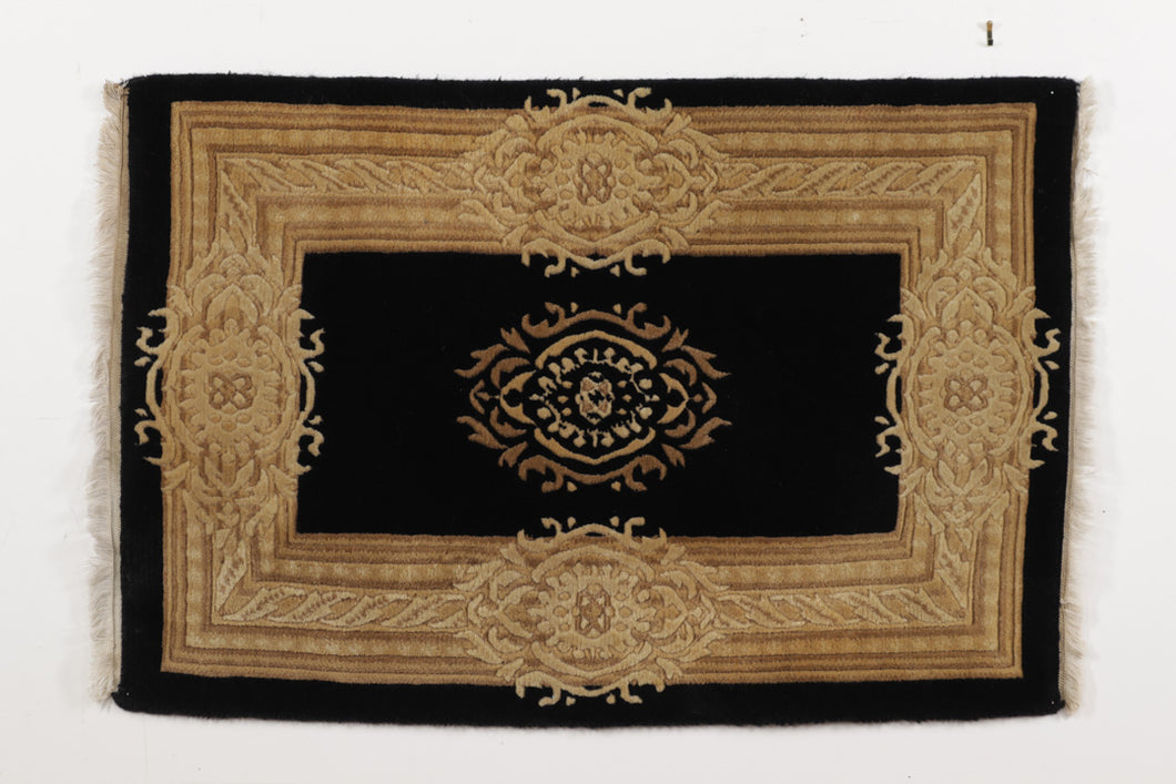 Small Black Rug with Golden Border and Center Medallion