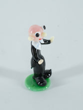 Load image into Gallery viewer, Hand-Blown Art Glass Figurine – Black-Suited Character on Green Base (Miniature Collectible)
