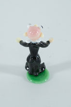 Load image into Gallery viewer, Hand-Blown Art Glass Figurine – Black-Suited Character on Green Base (Miniature Collectible)

