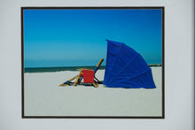 Load image into Gallery viewer, “Blue Beach Umbrella” by Scott Sroka – National Geographic Certified Framed Photograph – 22” x 18”
