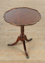 Load image into Gallery viewer, Brandt Mahogany Pie Crust Accent Table with Duncan Phyfe–Style Legs and Brass Claw Feet
