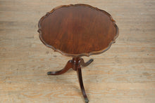 Load image into Gallery viewer, Brandt Mahogany Pie Crust Accent Table with Duncan Phyfe–Style Legs and Brass Claw Feet
