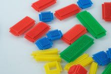 Load image into Gallery viewer, Vintage Playskool Bristle Blocks — Basic Set in Original Tin
