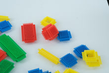 Load image into Gallery viewer, Vintage Playskool Bristle Blocks — Basic Set in Original Tin
