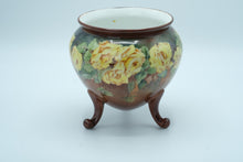 Load image into Gallery viewer, Hand-Painted Brown Ceramic Planter with Yellow Roses – 7” Round Footed Pot
