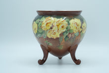 Load image into Gallery viewer, Hand-Painted Brown Ceramic Planter with Yellow Roses – 7” Round Footed Pot
