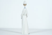 Load image into Gallery viewer, Lladró Porcelain Figurine – Elegant Policeman Statue, Handcrafted in Spain
