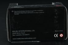 Load image into Gallery viewer, Malibu International Chevrolet Corvette (1957) – 1:87 Scale Die-Cast Model (Blue/White)
