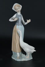 Load image into Gallery viewer, Lladró Porcelain Figurine – Girl Feeding Goose, Handcrafted in Spain
