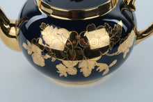 Load image into Gallery viewer, Vintage Gibson’s Teapot – Cobalt Blue with 22K Gold Floral Overlay – Staffordshire England – 9" Wide
