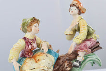 Load image into Gallery viewer, Capodimonte Boy and Girl Playing See Saw on Log
