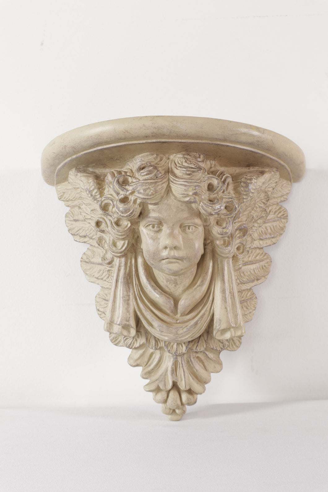 Carved Cherub Wall Sconce