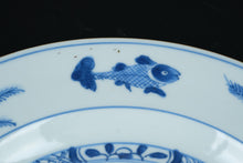 Load image into Gallery viewer, Blue &amp; White Porcelain Plate with Fish and Floral Motif – Believed to Be Antique Chinese Export
