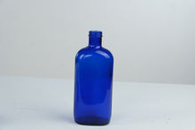 Load image into Gallery viewer, Vintage Cobalt Blue Glass Bottle 10 Inch Rectangular Medicine Style
