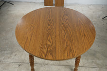 Load image into Gallery viewer, Cochrane Furniture Round Oak Extendable Dining Table with 2 Leaves
