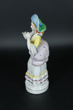 Load image into Gallery viewer, Vintage Colonial Lady Porcelain Figurine – 8.25” Hand-Painted Figurine with Bonnet and Ruffled Gown
