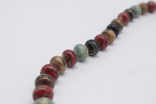 Load image into Gallery viewer, Art Glass Beaded Necklace Multicolor Red Blue Black Gold Swirl Beads
