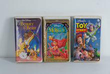 Load image into Gallery viewer, Disney VHS Trio – Beauty and the Beast, Toy Story, &amp; The Little Mermaid (Still Sealed!) – Classic Clamshell Editions – Perfect for Display &amp; Retro Decor
