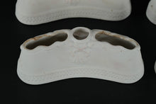 Load image into Gallery viewer, Set of 4 Antique German Bisque Porcelain Toothbrush / Razor Holders – Cherub Relief – 6" Vanity Accessories
