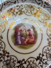 Load image into Gallery viewer, Antique O.P.Co. Syracuse China Decorative Plate – “Classical Scene” Gold Filigree &amp; Cobalt Rim
