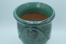 Load image into Gallery viewer, Glazed Turquoise Ceramic Vase / Planter with Raised Medallion – 10.5&quot; Tall
