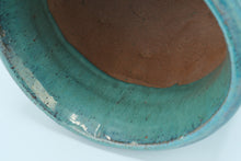 Load image into Gallery viewer, Glazed Turquoise Ceramic Vase / Planter with Raised Medallion – 10.5&quot; Tall
