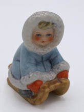 Load image into Gallery viewer, Goebel W. Germany Porcelain Figurine – Child in Blue Parka on Wooden Sled, Winter Scene
