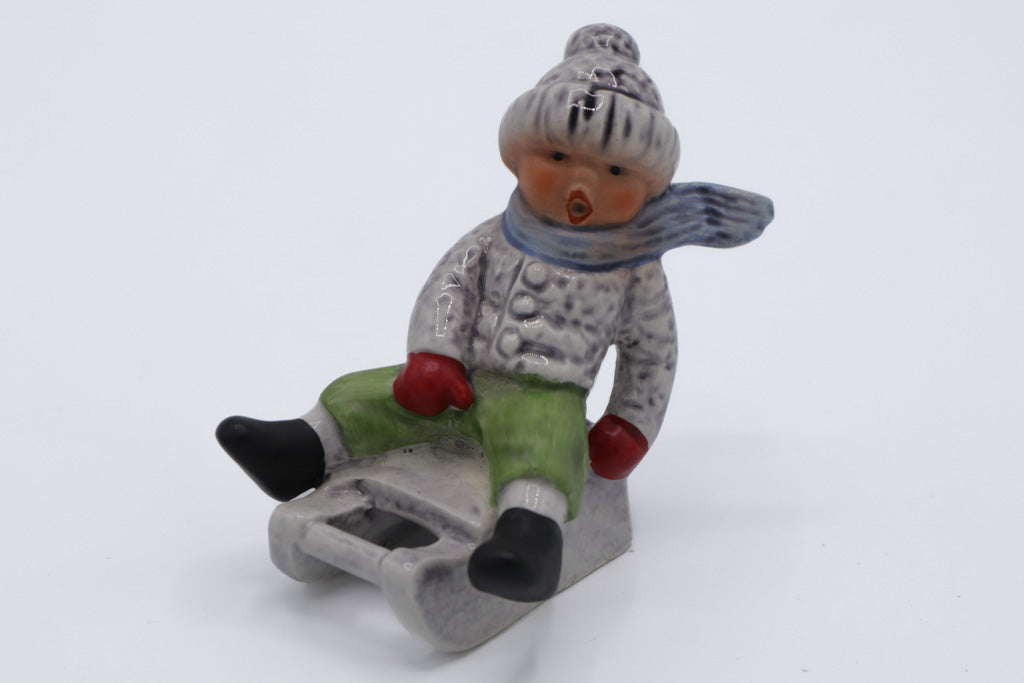 Goebel Porcelain Figurine – Child on Sled Winter Scene #13904-07, Hand-Painted Germany