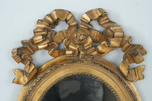 Load image into Gallery viewer, Gold Gilt Oval Wall Mirror Ribbon Bow Frame Hollywood Regency Style
