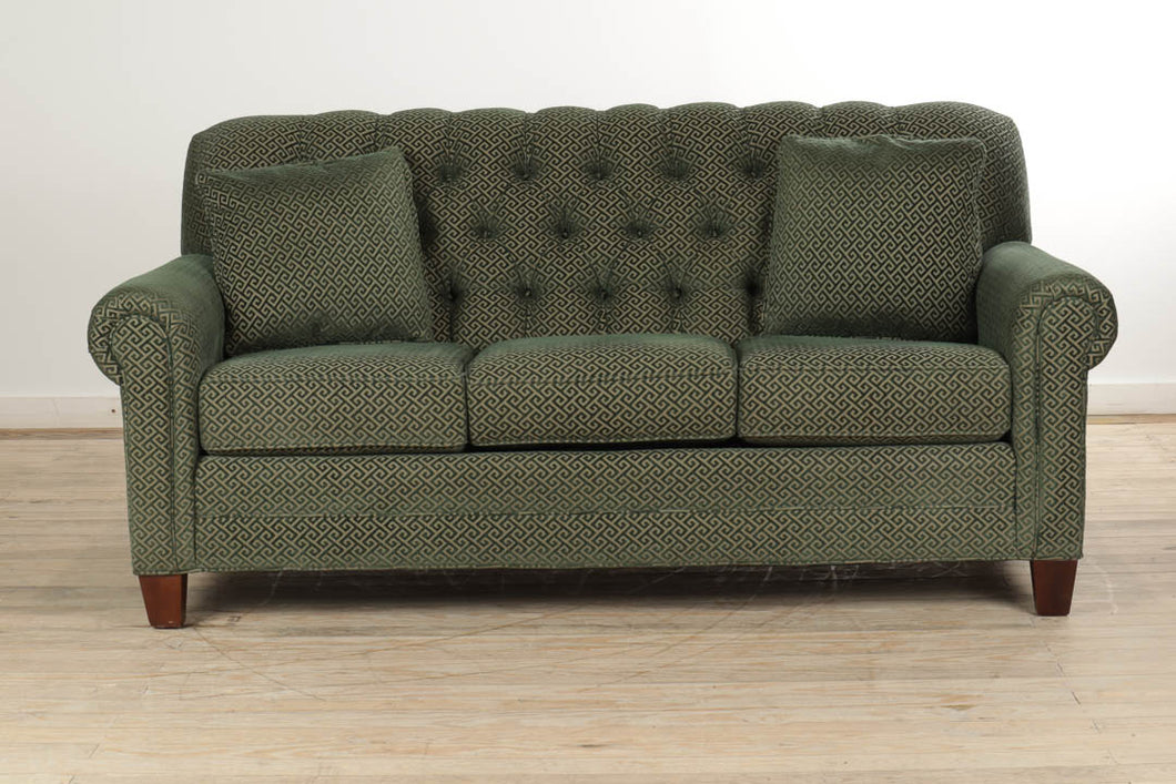 Green Couch with Tufted Back