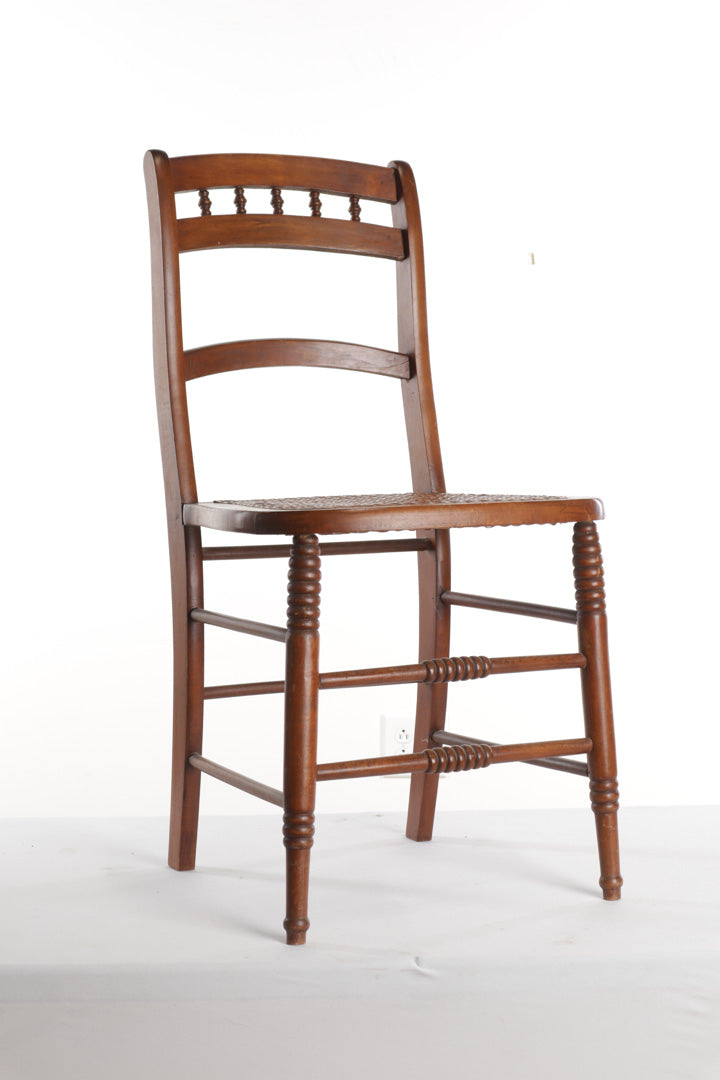 Hand Caned Chair with Spun Details