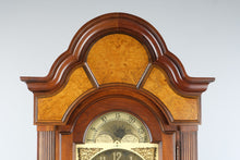 Load image into Gallery viewer, Howard Miller Triple Chime Grandfather Clock with Moving Moon Dial
