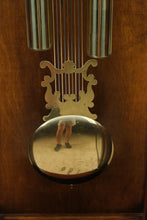 Load image into Gallery viewer, Howard Miller Triple Chime Grandfather Clock with Moving Moon Dial
