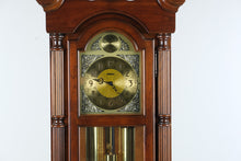 Load image into Gallery viewer, Howard Miller Traditional Cherry Grandfather Clock with Moon Phase Dial and Cable Driven Movement
