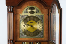 Load image into Gallery viewer, Howard Miller Traditional Cherry Grandfather Clock with Moon Phase Dial and Cable Driven Movement
