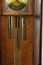 Load image into Gallery viewer, Howard Miller Traditional Cherry Grandfather Clock with Moon Phase Dial and Cable Driven Movement
