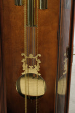 Load image into Gallery viewer, Howard Miller Traditional Cherry Grandfather Clock with Moon Phase Dial and Cable Driven Movement
