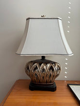 Load image into Gallery viewer, Ornate Carved Metal Table Lamp with Leaf Motif Base &amp; White Shade – Traditional Accent Lighting
