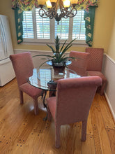 Load image into Gallery viewer, 42&quot; Round Glass Top Dining Set with Swan Base and 4 Parsons Chairs

