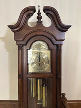Load image into Gallery viewer, Howard Miller 61st Anniversary Grandfather Clock – Traditional Cherry Wood Longcase Clock
