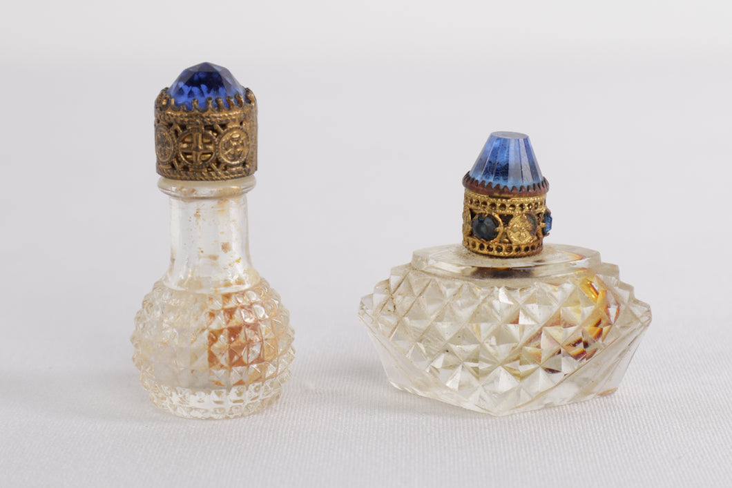 Pair of Vintage Cut Glass Perfume Bottles with Ornate Jeweled Blue Stoppers – Vanity Collectible
