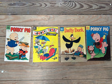 Load image into Gallery viewer, Lot of 4 Vintage Dell Looney Tunes Comics — Porky Pig, Daffy Duck &amp; Looney Tunes (1950s–1960s) | Classic Warner Bros. Characters
