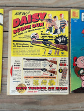 Load image into Gallery viewer, Lot of 4 Vintage Dell Looney Tunes Comics — Porky Pig, Daffy Duck &amp; Looney Tunes (1950s–1960s) | Classic Warner Bros. Characters
