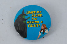 Load image into Gallery viewer, “Leave Me Alone, I’m Having a Crisis!” Pinback Button – Wizard of Oz Parody Humor Badge
